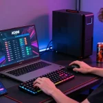 Exciting KO66 app gaming environment showcasing a young adult engaged with modern gaming setup.